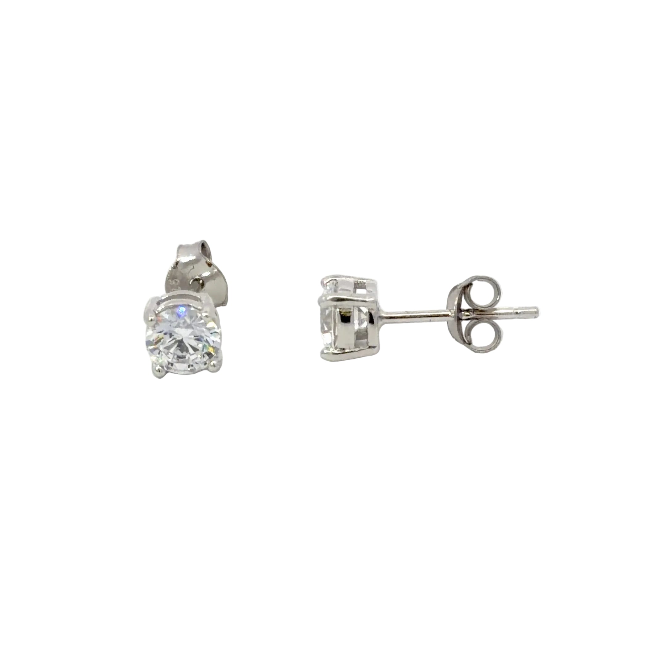 Pair of silver stud earrings with white CZ stones on a white background