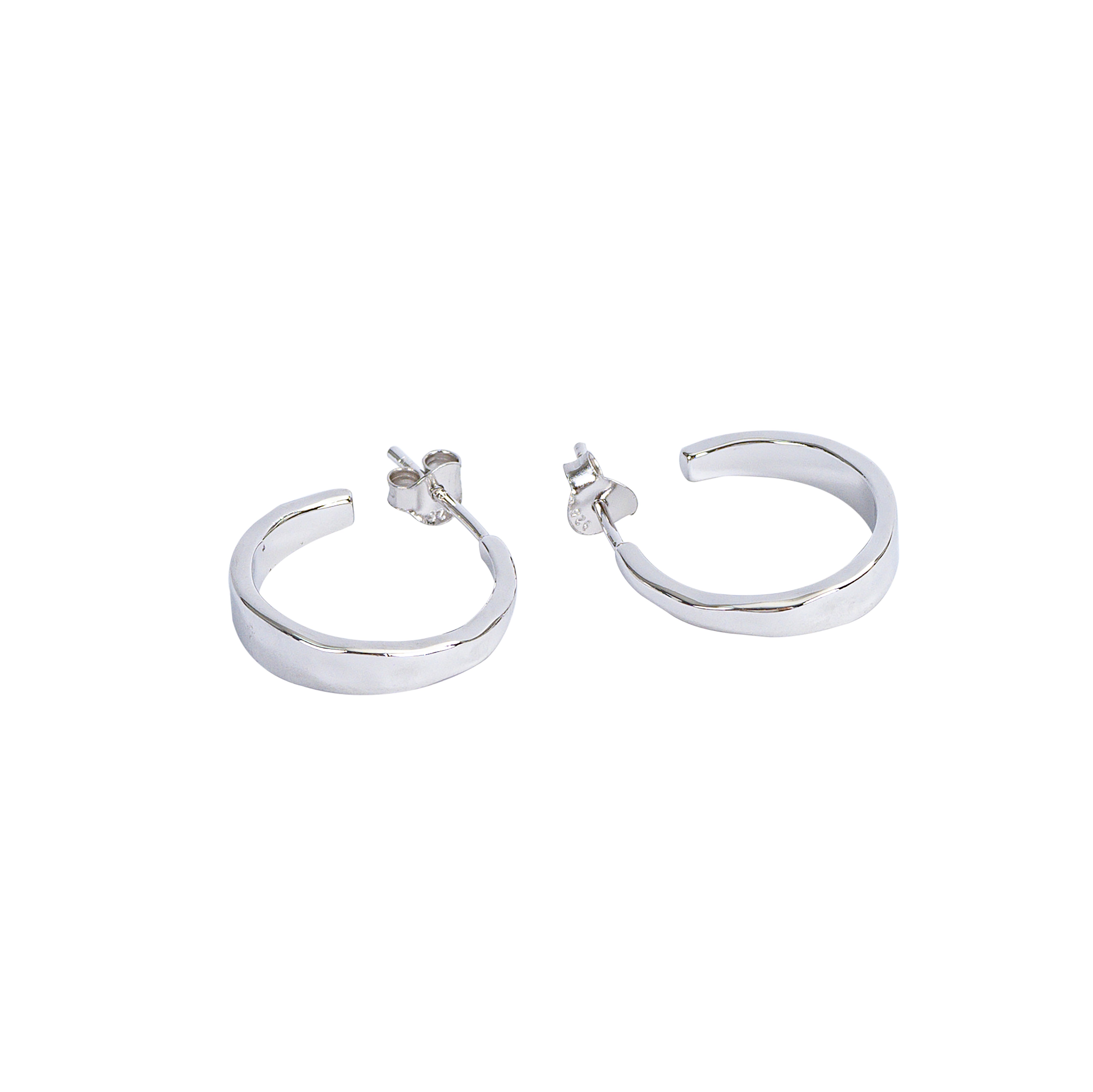 Pair of sterling silver hoop earrings on a white background