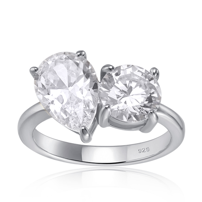 Features a 1-carat round cut stone (7mm x 7mm) and a 1.5-carat pear cut stone (10mm x 7mm) double center stone
Solitaire setting set in a beautiful prong setting
Sterling silver plated with Rhodium
Also available in gold
Ring sizes 4 through 11