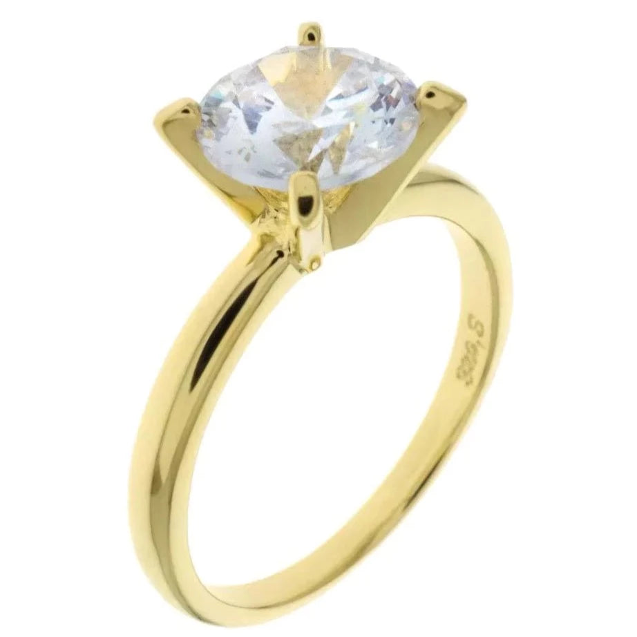 Features 1.5-carat round cut solitaire center stone in a solitaire setting
Set in a7mm band with prongs
Sterling silver with 14K plating
Available in silver and in sizes 4 through 10