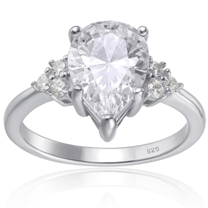 Features a 2-carat (11mm x 8mm) pear shape center stone
Surrounded by 3 round cut stones on each side of the center stone
Set in a stunning prong setting in sterling silver and plated in Rhodium
Available in sizes 4 through 11