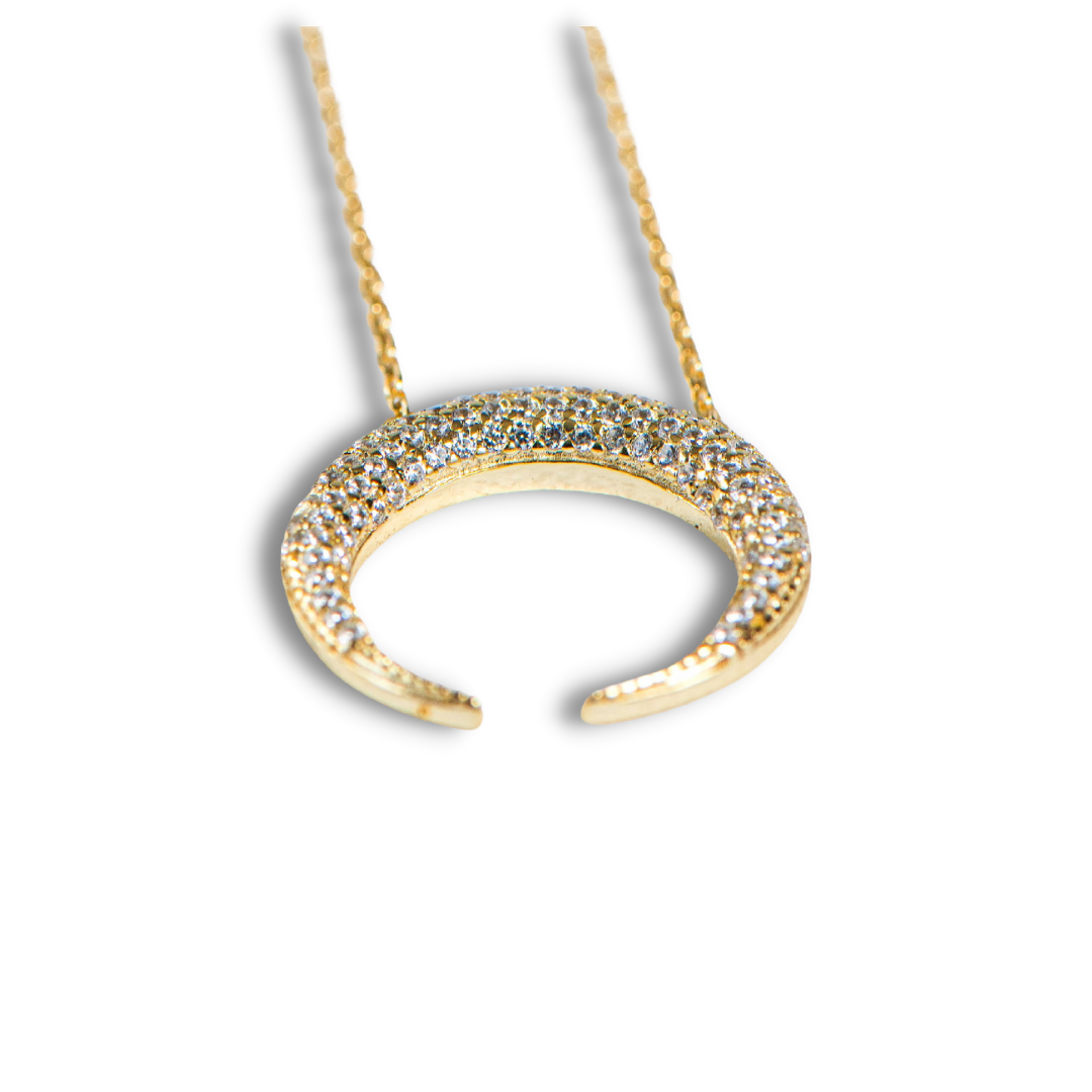 Created with certified 925 sterling silver
Plated in 14k gold or rhodium
100% simulated diamond material (AAA CZ) stones
The chain is extendable up to 17.5”, and the moon measures approximately 3/4”