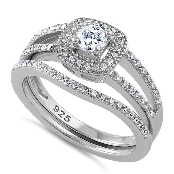 Features a round .3 carat center stone
Surrounded by a beautiful halo of tiny stones in a prong setting
4 mm wide 925 sterling silver Rhodium plated band
Includes an additional band with tiny clear Triple A CZ stones
Available in sizes 4 through 12