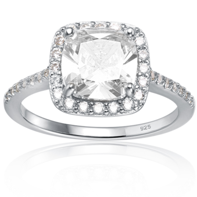 Features a 2-carat Asscher cut center stone
A dazzling halo surrounding it, adding to the sparkle
Surrounded by a delicate halo and pavé band
Sterling silver and plated in 14K gold
Available in silver and in sizes 4 through 11