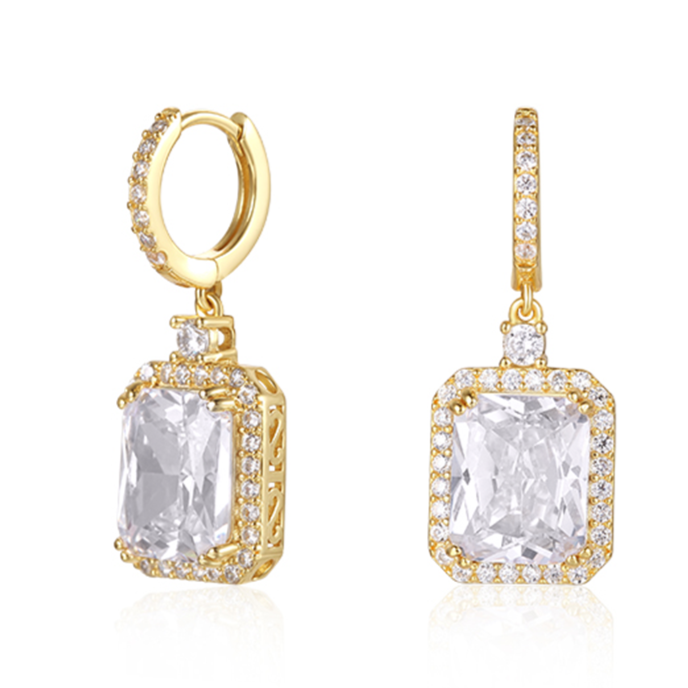Features a 4-carat emerald cut stone surrounded by a halo of small stones around the main stone
Sterling silver plated in 14K gold
Huggie style earring design
Also available in silver