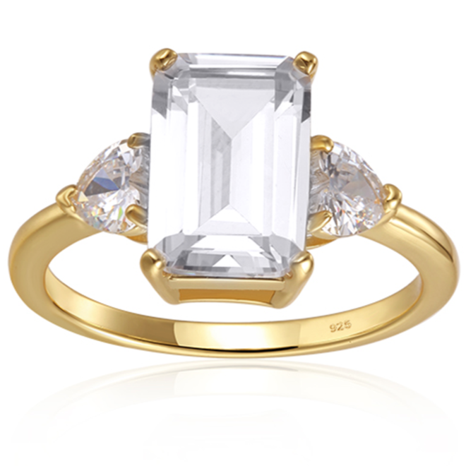 Features a 4-carat emerald-shaped stone center stone
Surrounded by 2 smaller .5 carats heart cut stones set in a prong setting
Sterling silver band with 14K gold plating
Available in silver and in sizes 4 through 11