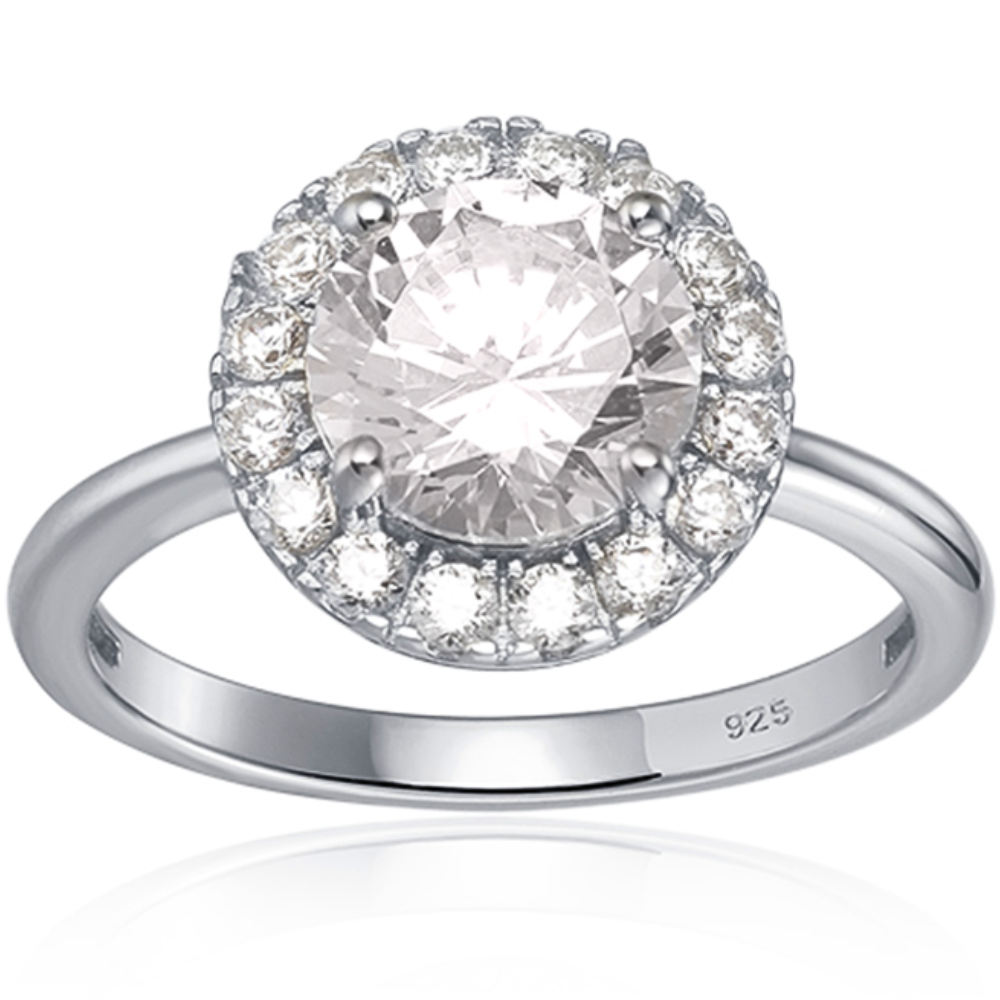 Features a 2-carat round cut center stone
Triple A CZ stones surround this center stone in a gorgeous halo
Set in a prong setting with Rhodium plating
Available in gold and in sizes 4 through 11