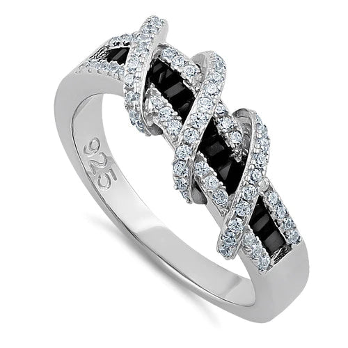 Features a wild twist of 81 black clear CZ stones
Set in a mesmerizing mix of channel prong settings with a glossy rhodium plating
Measures 8.4mm top height and 3.9mm band width
Available in sizes 4 through 12