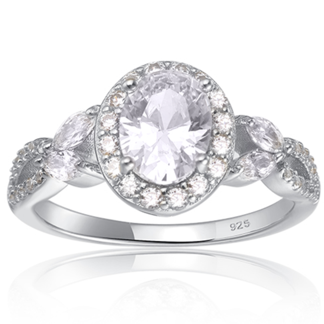 1.5-carat oval cut ring is surrounded by a halo of stones, both around the stone, and on the band
Center stone is about 9 mm tall with 2 marquise stones (4mm) on either side of the center stone
Available in sizes 4 through 11