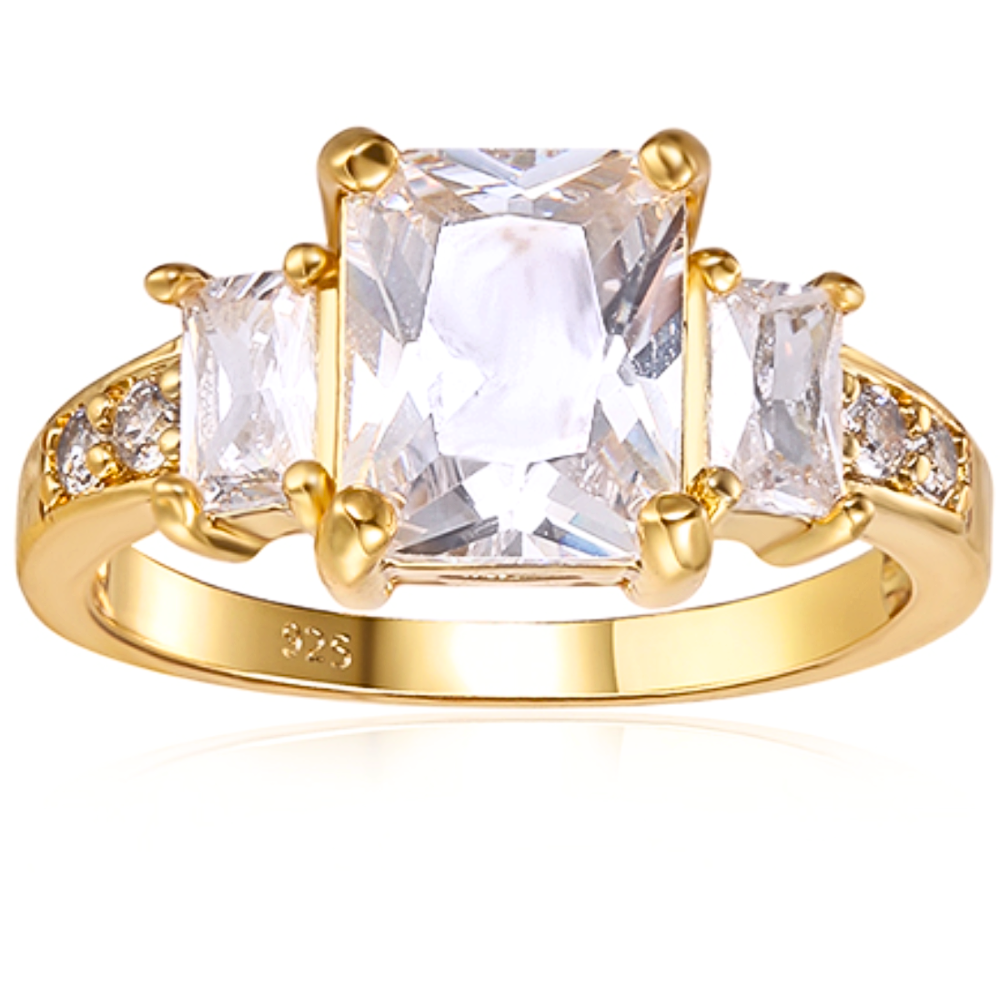Features a 3-carat emerald center stone
Surrounded by two .5-carat emerald cut stones
Set in a gorgeous prong setting
The Gretchen ring has 7 total stones