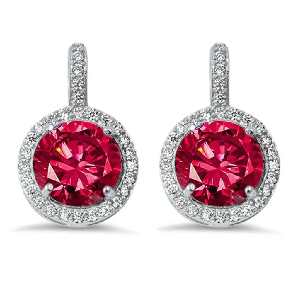 Feel flawless in theses classic round-cut halo earrings with lots of sparkle.
Lightweight for everyday wear, wear these on date night or around the house.
Made of sterling silver and plated in rhodium,
These earrings are hypoallergenic and a great gift for yourself of someone else.
The center Ruby stone is 1.5 carats and they hang 3/4".