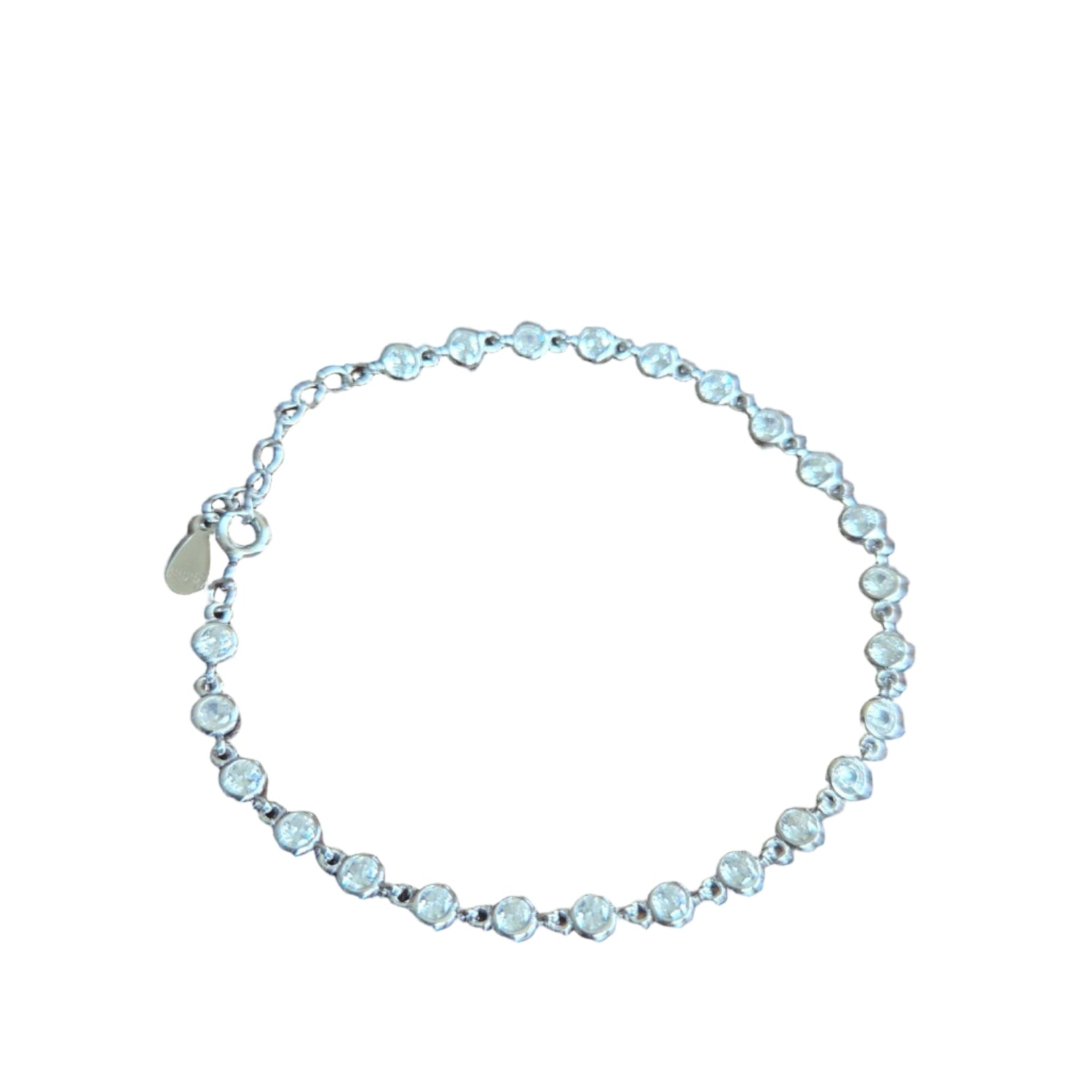 Silver bracelet round CZ stones on a white background