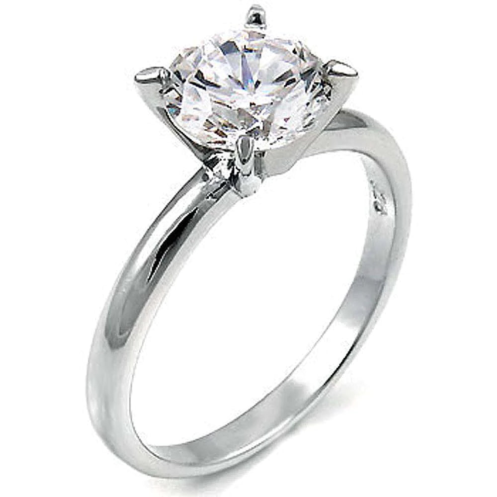 Features 1.5-carat round cut solitaire center stone in a solitaire setting
Set in a7mm band with prongs
Sterling silver with Rhodium plating for long-lasting shine
Available in gold and in sizes 4 through 10