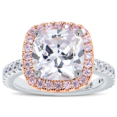 Features a stunning 2.75-carat cushion center stone
Surrounded by a glorious pink halo on a rose gold raised setting
Pavé band set in a prong setting in sterling silver
Available in sizes 4 through 12