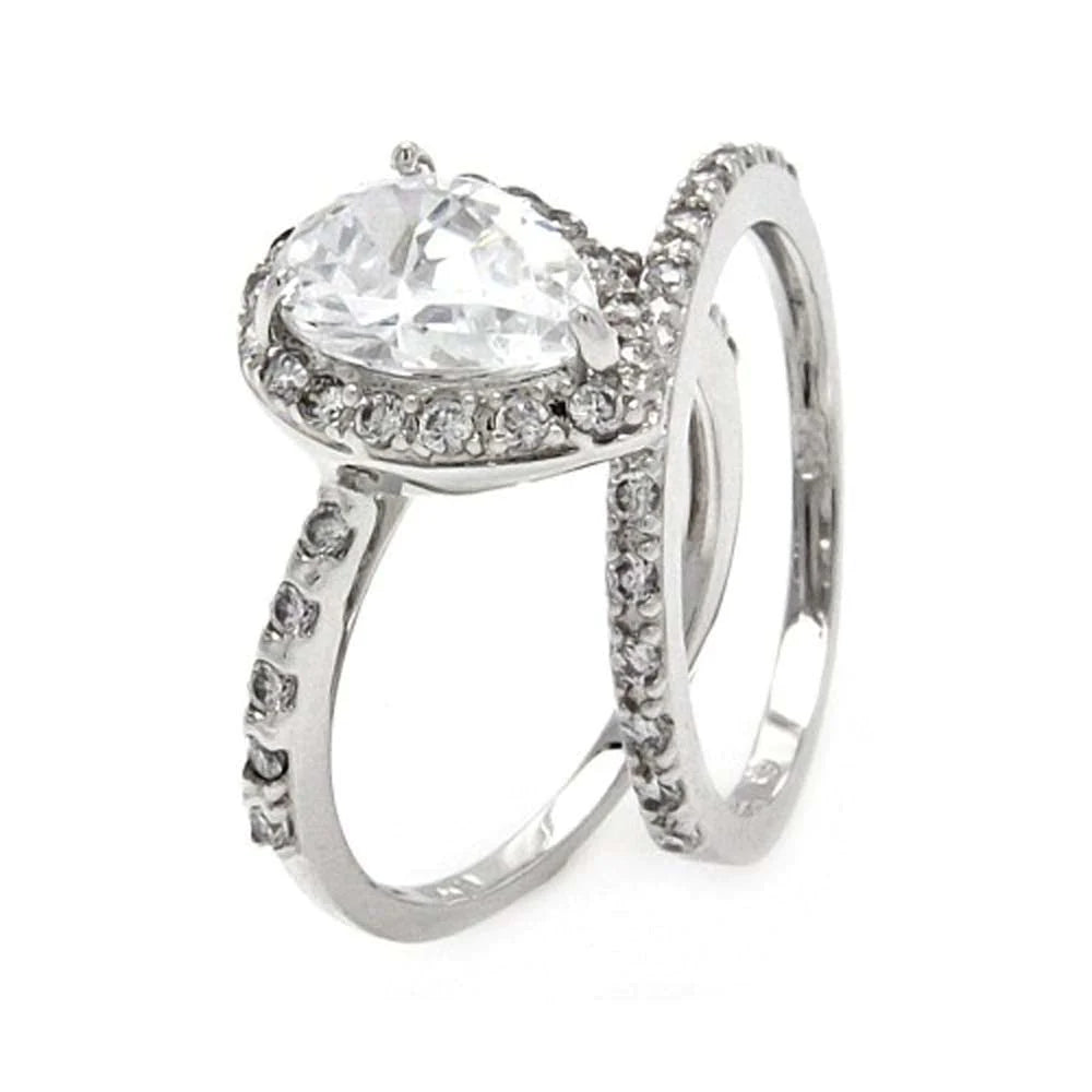 Features a 2-carat pear shaped center stone
Surrounded by a diamond halo.
Includes 5 delicate stones go down each side of the band.
This set includes a band with 14 small stones
Available in sizes 5 through 9