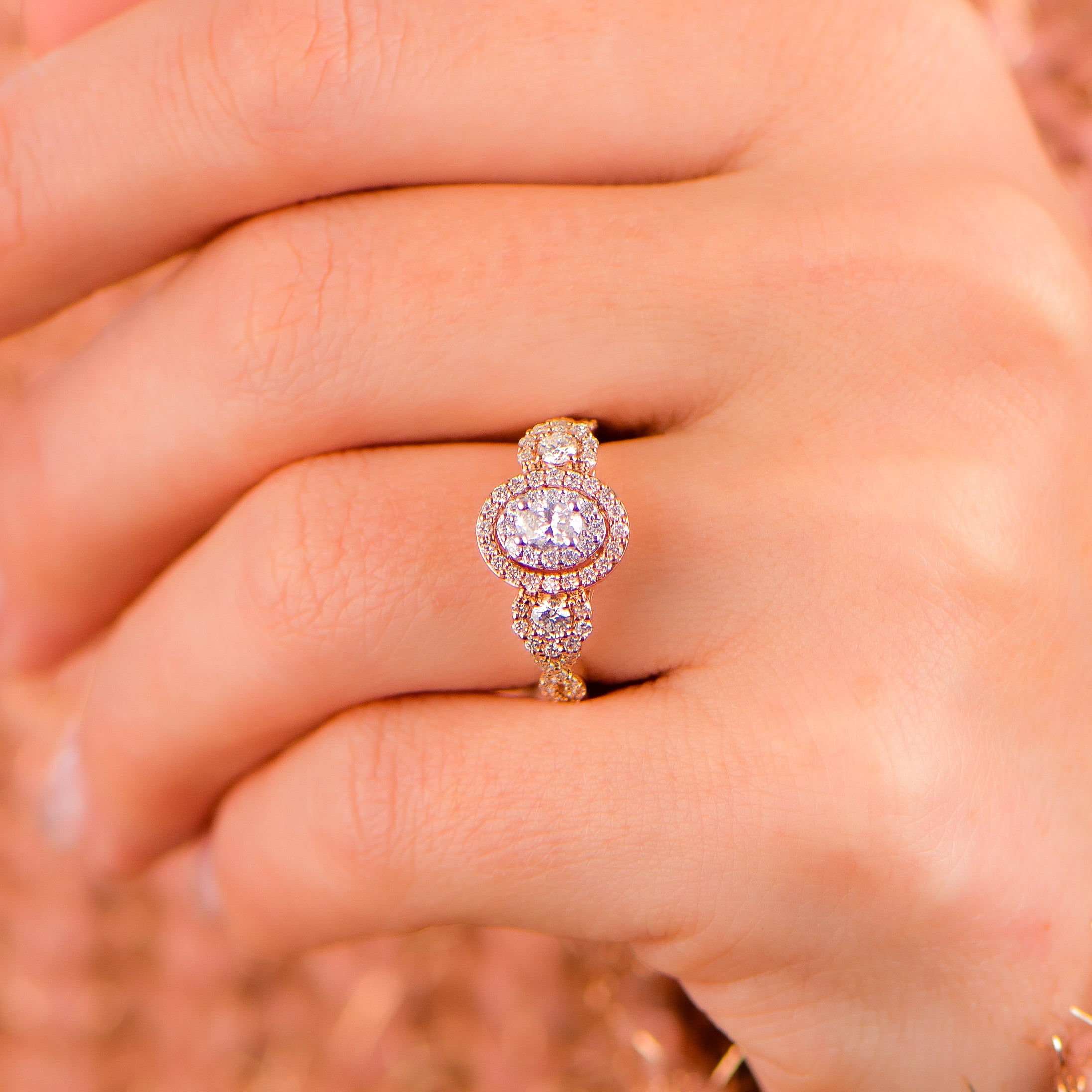 This limited edition oval with a double halo is 1-carat total weight of genuine diamonds, thoughtfully placed in an intricate prong setting.

Stunning round stones are set in 14kt rose gold
Creates a truly unique and beautiful piece of jewelry.
The diamonds are of exceptional quality, rated as Color D.
Perfect for any occasion, this diamond ring is a timeless addition to any jewelry collection.
