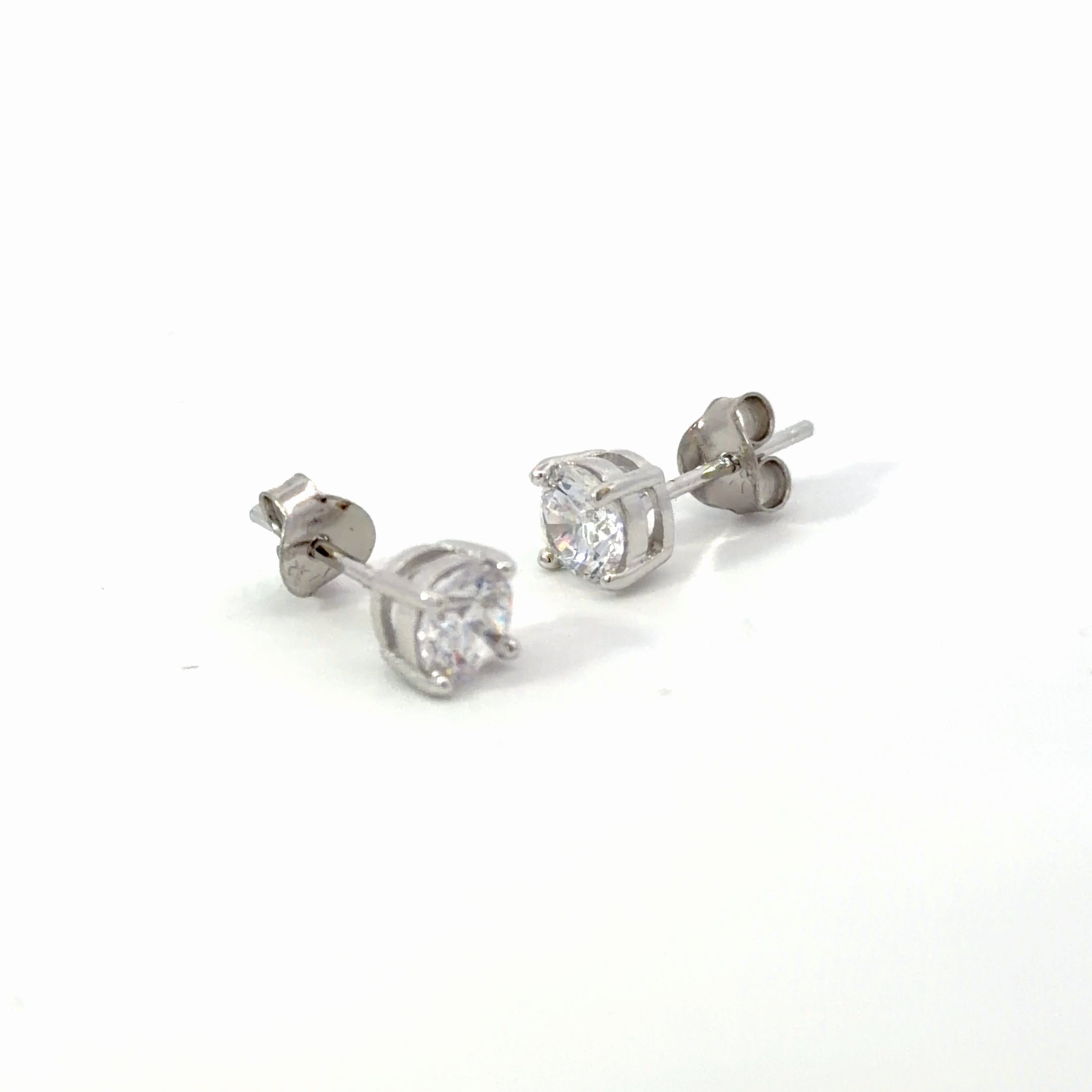 Brilliant Round Cut Stud Earrings in Silver - Effortlessly Elegant