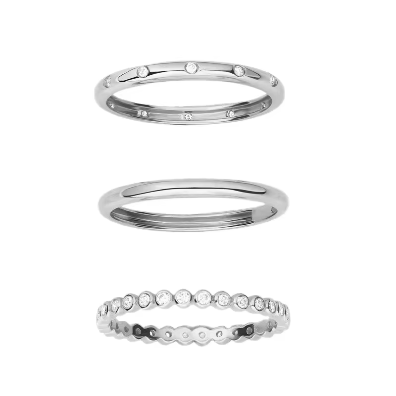 Three sterling silver rings with white CZ stones, creating a perfect stack.