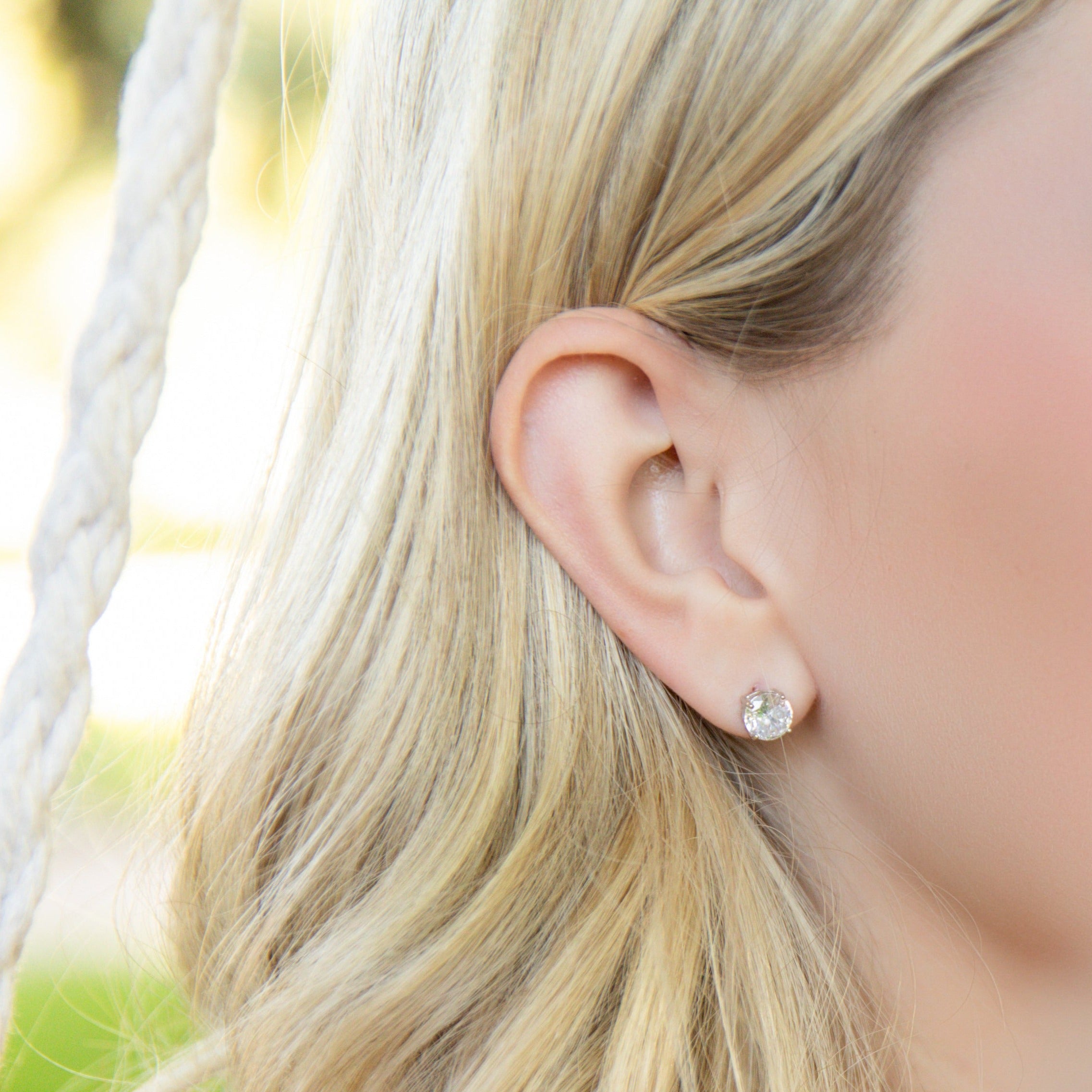 Brilliant Round Cut Stud Earrings in Silver - Effortlessly Elegant