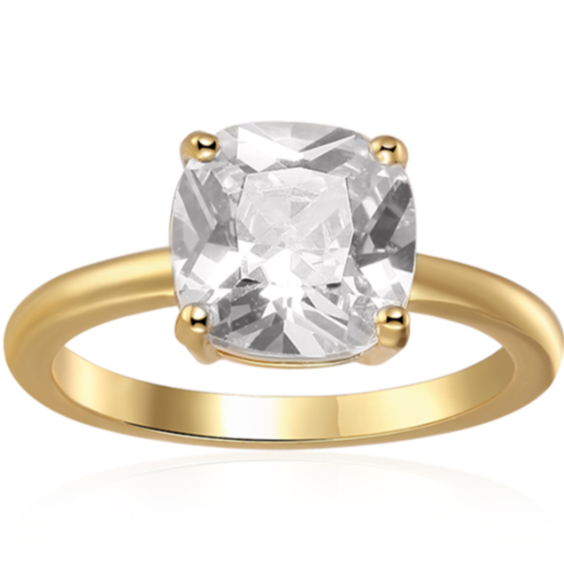 Features a stunning 2 carat cushion cut solitaire
Set in a beautiful 4 prong setting
Sterling silver plated in 18K gold
Available in sizes 4 through 11