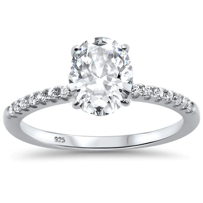 Features a 2-carat oval center stone
Set in a basket prong setting
Surrounded round stones inlaid in the sterling silver band