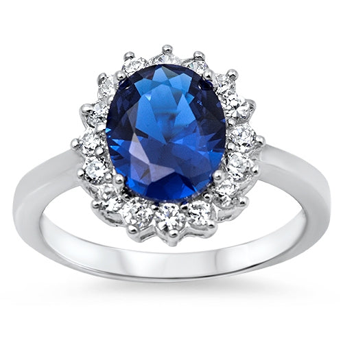 Features a 2 carat Blue Spinel Sapphire oval center stone
Surrounded by a halo of 16 small stones

Sterling silver and Rhodium-plated for long-time sparkle and durability