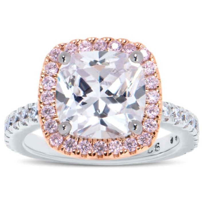 Features a stunning 2.75-carat cushion center stone
Surrounded by a glorious pink halo on a rose gold raised setting
Pavé band set in a prong setting in sterling silver
Available in sizes 4 through 12