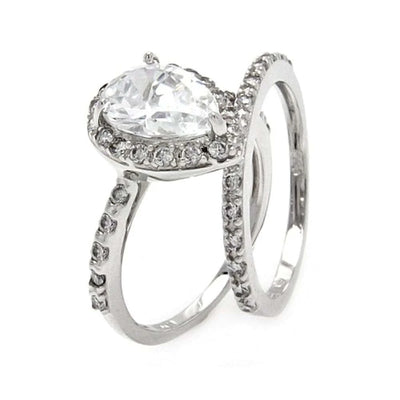 Features a 2-carat pear shaped center stone
Surrounded by a diamond halo.
Includes 5 delicate stones go down each side of the band.
This set includes a band with 14 small stones

Available in sizes 5 through 9
