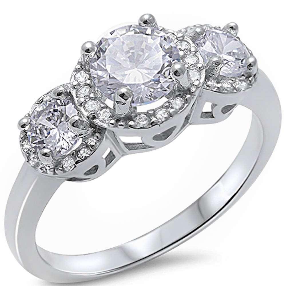 Each of the 3 stones is surrounded by intricate halos, with the center stone having a .75 weight
Set in a beautiful prong setting with sterling silver