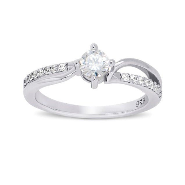 Asymmetrical ring features a .25 carat round cut stone
Trailed by more petite stones set in a prong setting
Set in certified 925 sterling silver band and is plated in rhodium and the 100% simulated diamond material (AAA CZ) stones