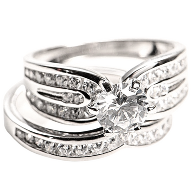 Features a 1.5-carat round cut center stone
Surrounded by a beautifully enhanced triple band design
Set in sterling silver with a prong and bezel setting
Plated in Rhodium

Available in sizes 4, 9, 11, 12, and 13